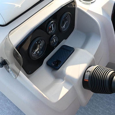 Dashboard with 4 gauges and open storage compartment