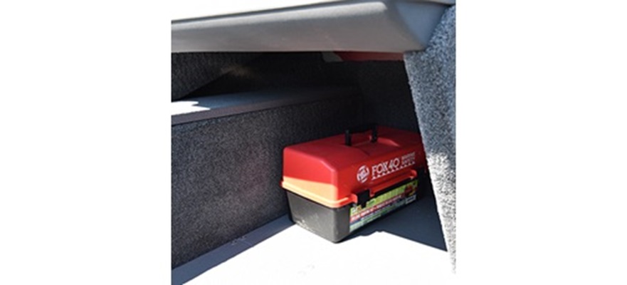 Rangement sous la console passager